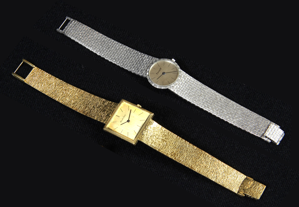 Lotes 649 y 650: 
RELOJ PULSERA DE ORO BLANCO MARCA PIAGET PARA DAMA.
RELOJ PULSERA DE ORO MARCA BUECHE GIROD. 