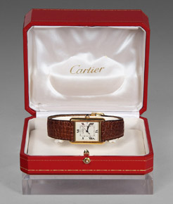 Lote 61: RELOJ PULSERA DE ORO MARCA CARTIER PARA DAMA. RELOJ PULSERA DE ORO MARCA CARTIER PARA DAMA.