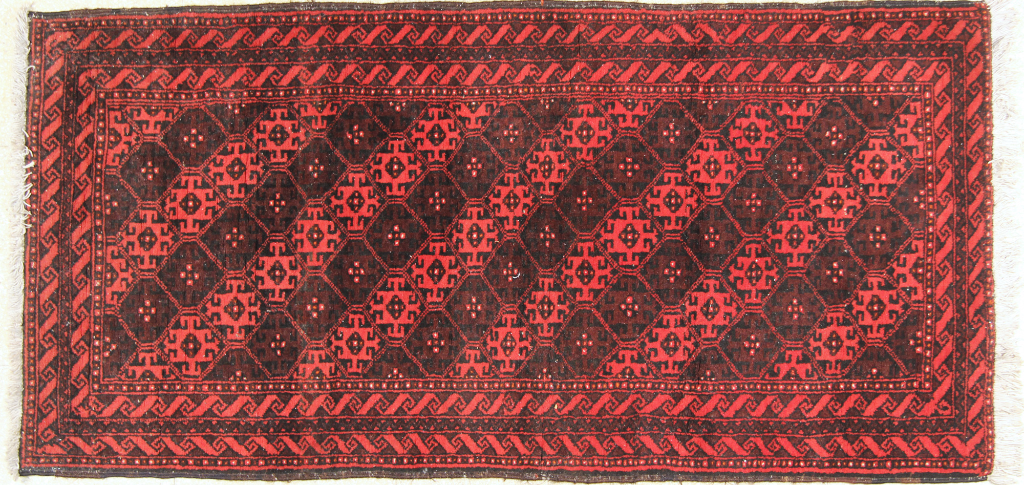  PEQUEÑA ALFOMBRA DE LANA TEJIDA A MANO.