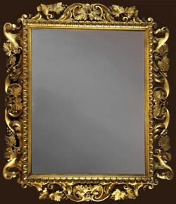 Lote 619: ESPEJO CON ENMARCAMIENTO DE MADERA TALLADA Y DORADA.  ESPEJO CON ENMARCAMIENTO DE MADERA TALLADA Y DORADA. 
