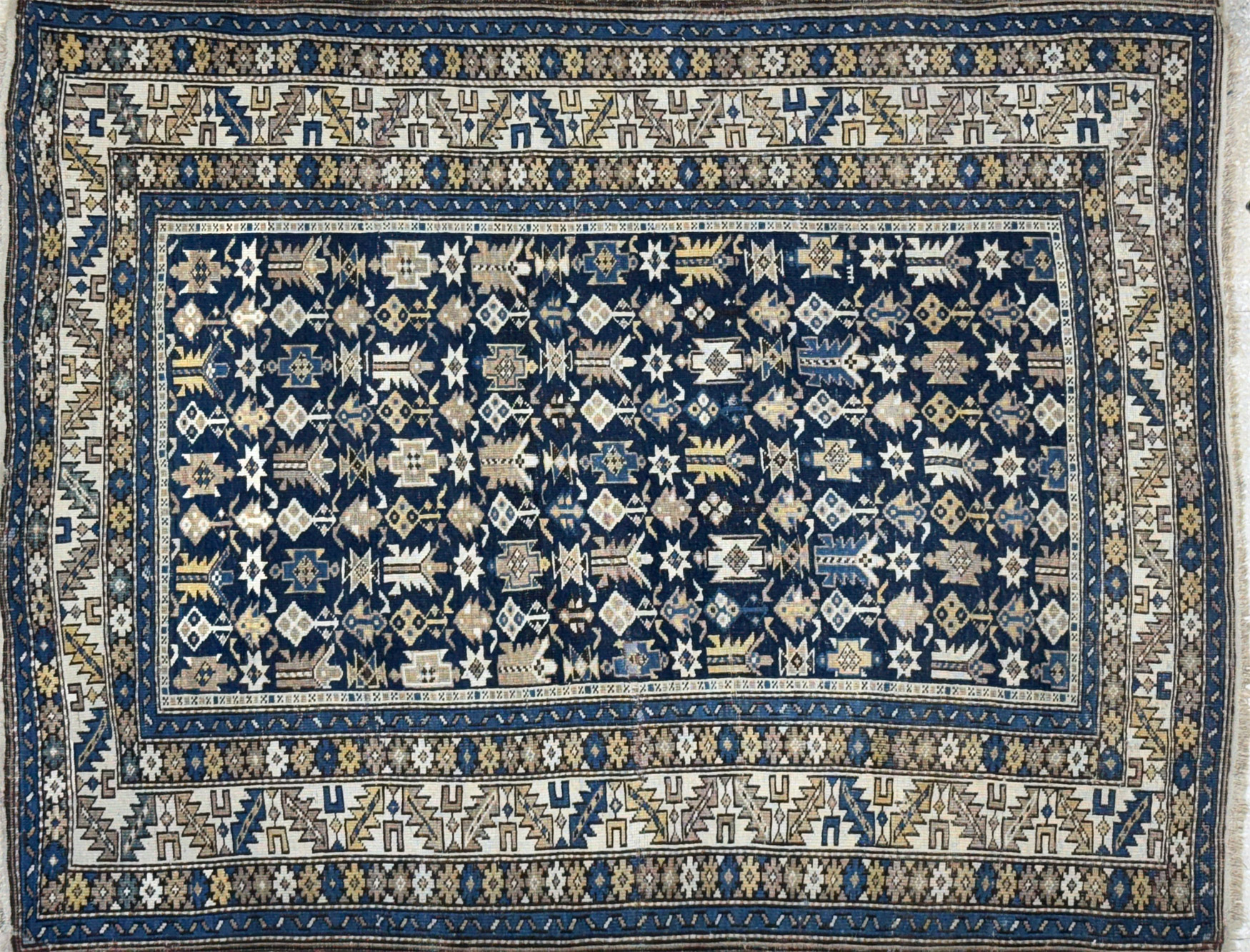  PEQUEÑA ALFOMBRA CAUCASICA DE LANA TEJIDA A MANO. 